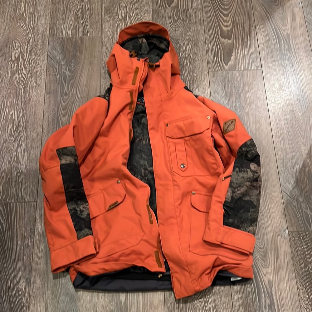 Dakine mens medium ski and snowboard jacket orange Camo